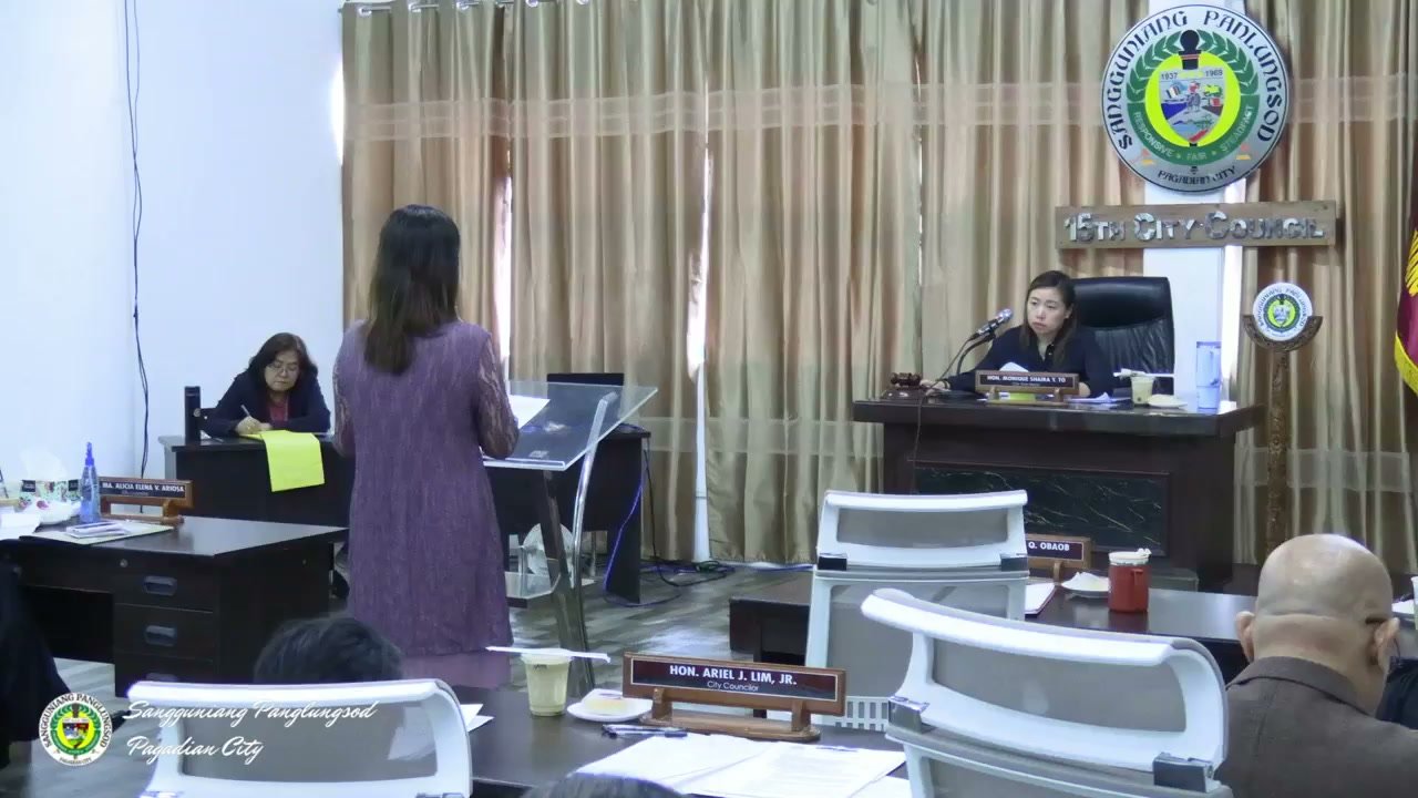 A council member addresses the body from the podium late in the 46th Regular Session, with the Vice Mayor presiding.